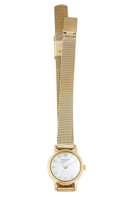 A striking watch with a diamond at the 12 o'clock position and a gold metal band. Features solar-powered technology, eliminating the need for battery changes. Watch ¥43,200