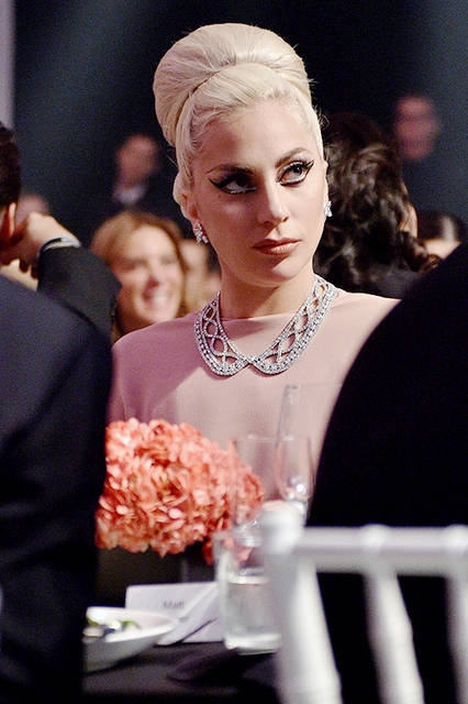Lady Gaga's individuality was reflected in the brilliance of the "Cluster Earrings" and "Queen Diamond Necklace."