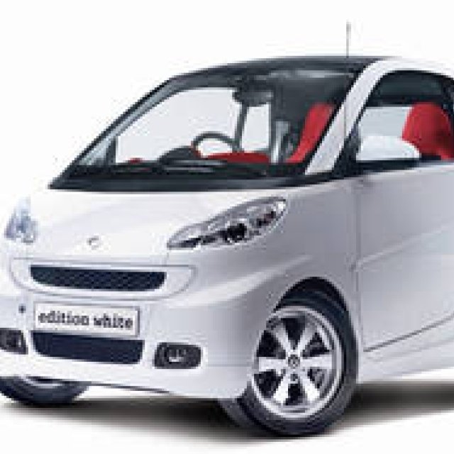 A special edition model where a vibrant red interior stands out against a pure white exterior | smart