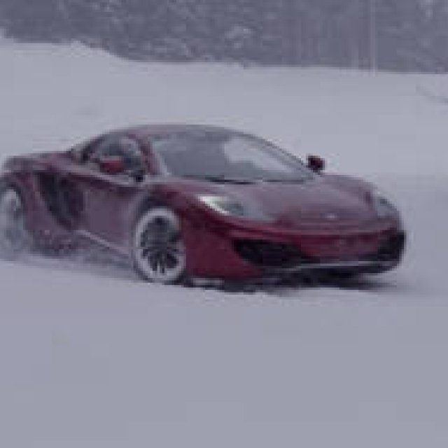 Snowboarder vs. MP4-12C Spider | McLaren