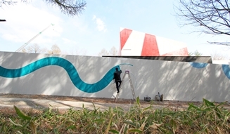 Dancing at a wall