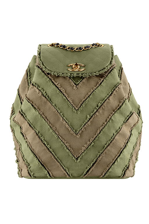 White toile backpack embroidered with golden and white sequins